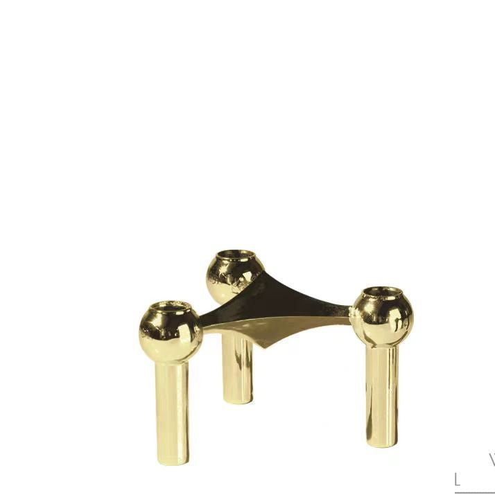 A tripod candlestick alloy decorative ornament