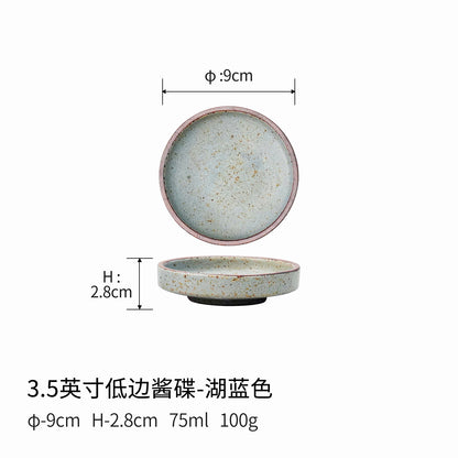 A rough pottery dipping sauce dish