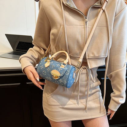 A denim bag cylinder bag