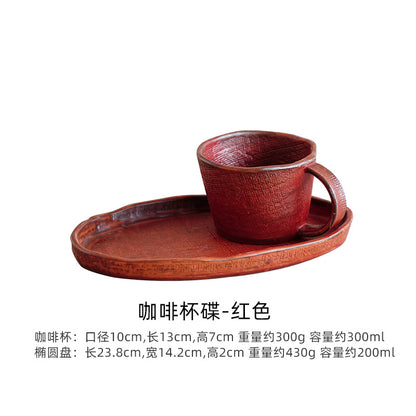 A handmade ceramic cup and saucer set