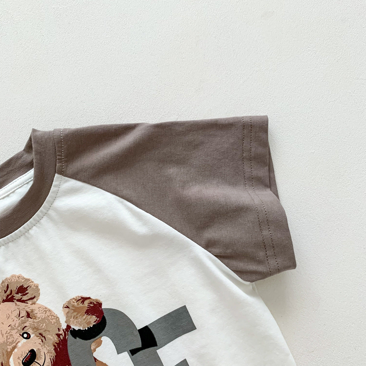 A Trendy 2023 Summer Korean Edition Loose Men's Treasure Triangle Bag Bottom Coat Baby Brown Little Bear Soft and Comfortable Cotton Climbing Clothes - Mixbatch