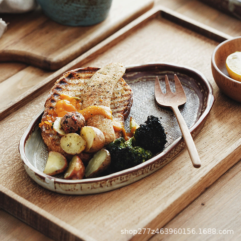 A handmade ceramic cup and saucer set