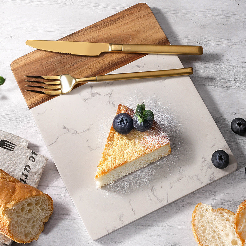 A solid wood cutting board marble splicing acacia wood