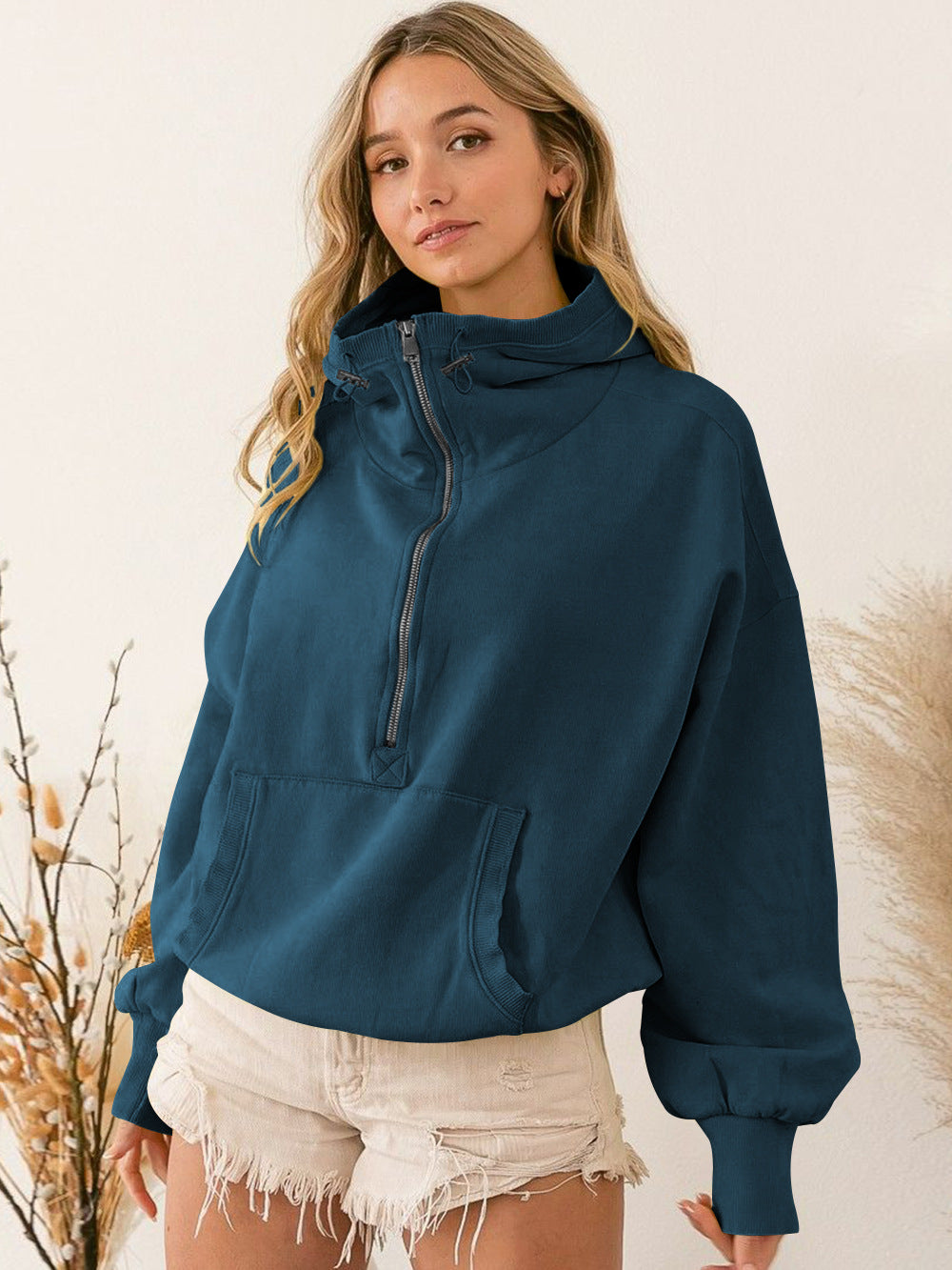 A hooded long-sleeved sweater