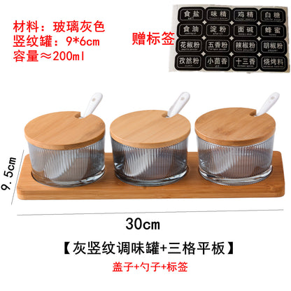 A kitchen seasoning box bamboo cover glass jar