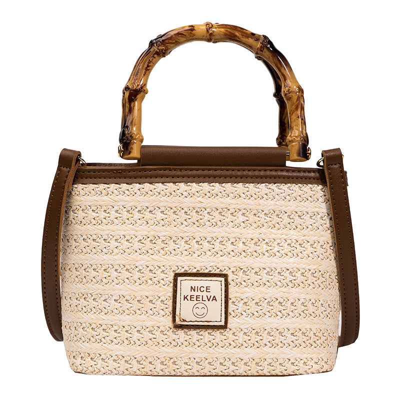 A summer new textured bamboo handle woven bag Thailand travel vacation fashion messenger straw bag