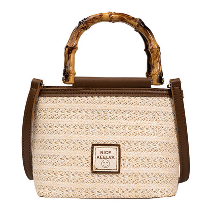 A summer new textured bamboo handle woven bag Thailand travel vacation fashion messenger straw bag