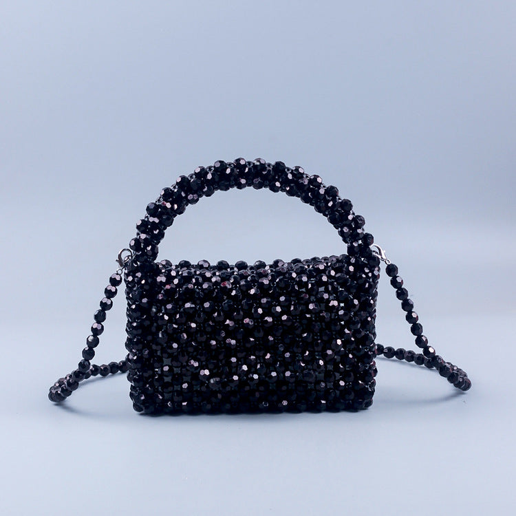A simple black horn bead acrylic handbag bag handmade beaded woven portable messenger bag