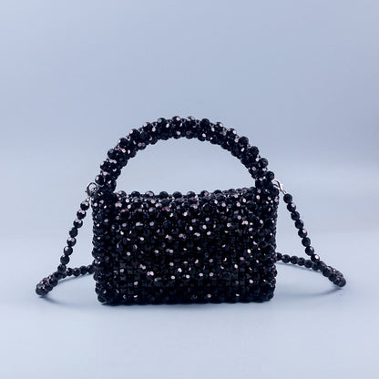 A simple black horn bead acrylic handbag bag handmade beaded woven portable messenger bag