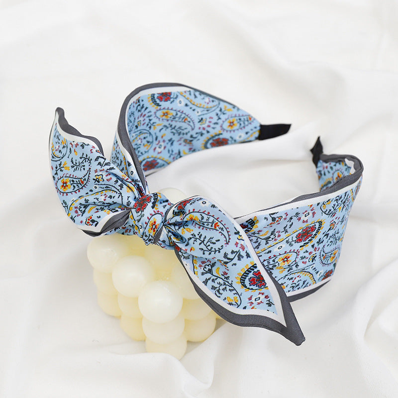 A Korean version of the new product headband fashion calico geometric wide edge headgear hair bundle go out bow hairpin