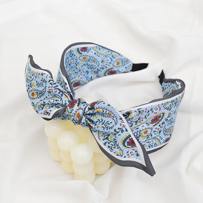 A Korean version of the new product headband fashion calico geometric wide edge headgear hair bundle go out bow hairpin
