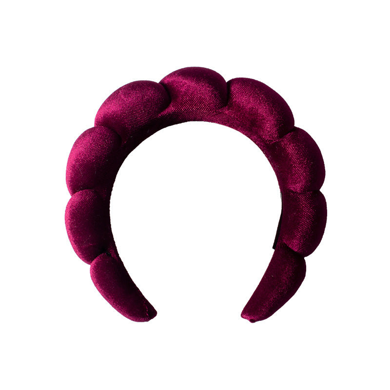 A towel fleece sponge twist headband