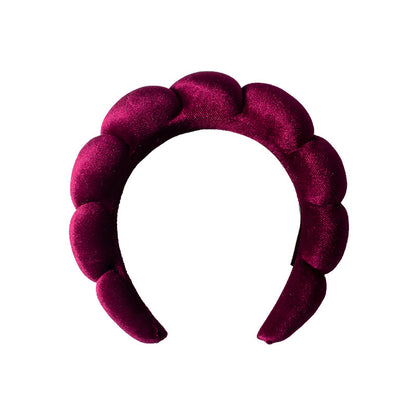 A towel fleece sponge twist headband