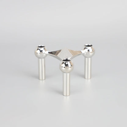 A tripod candlestick alloy decorative ornament