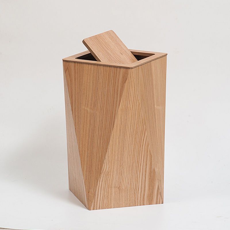 A wooden trash can