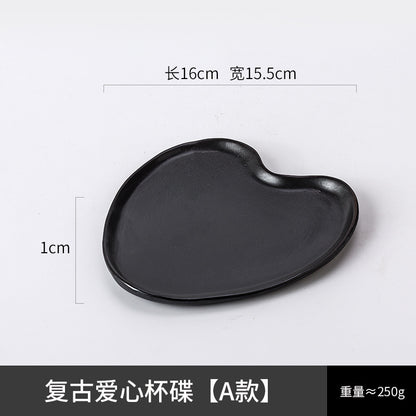 A ceramic coffee cup and saucer set