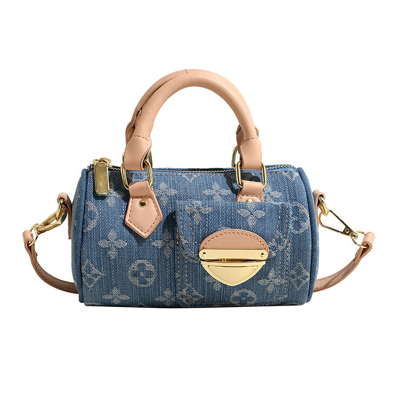 A denim bag cylinder bag