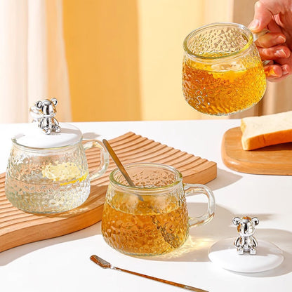 A bear mug a glass cup