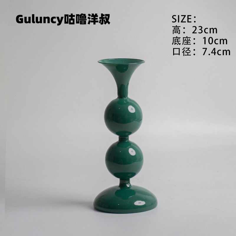 A vintage French Roman column glass candle holder