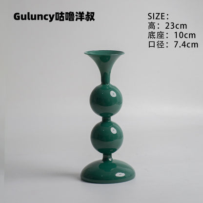 A vintage French Roman column glass candle holder