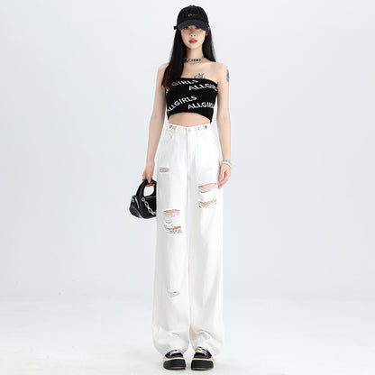 A pair of ripped white jeans