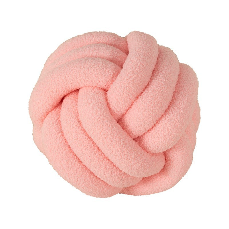 A braided knotted ball pillow