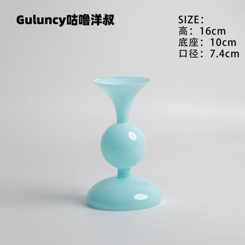 A vintage French Roman column glass candle holder