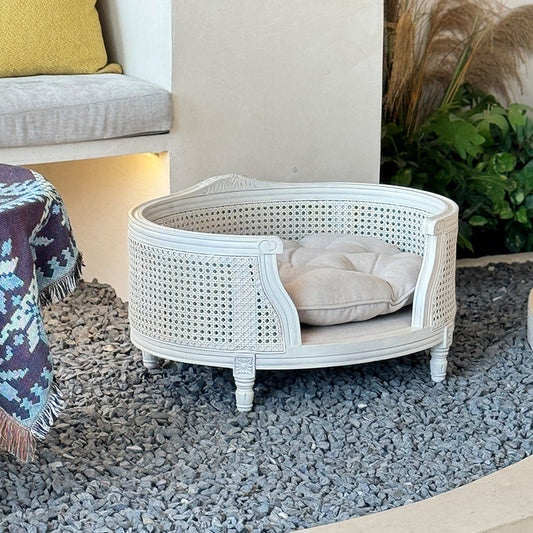 A solid wood pet bed