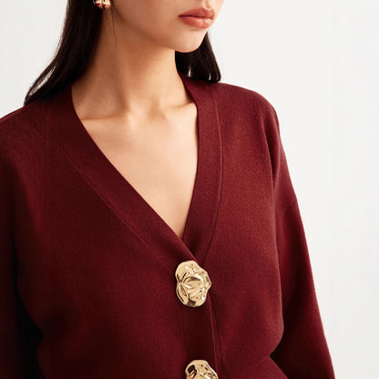 A button-down V-neck knitted sweater