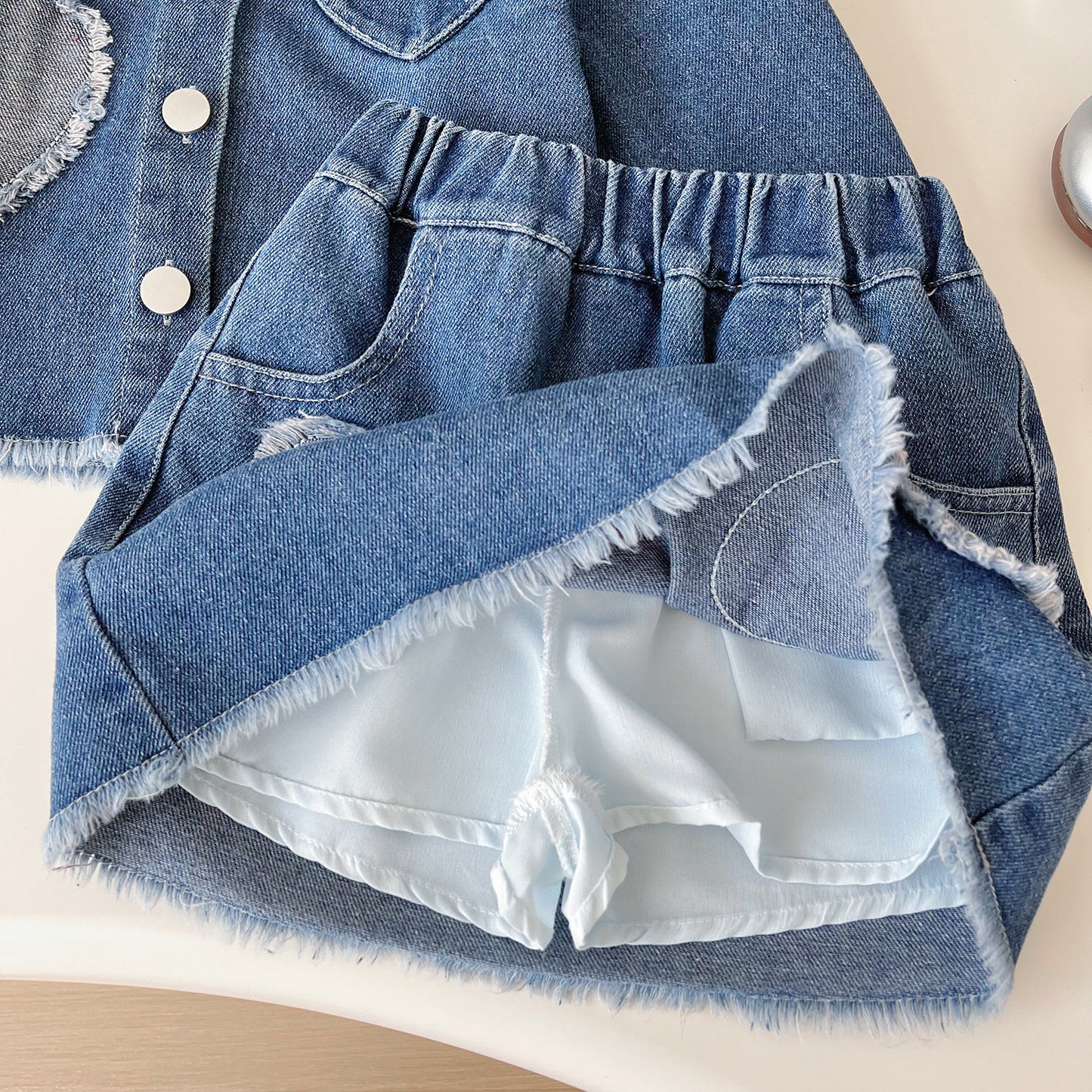 A children's denim suit