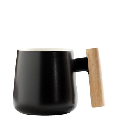 A wooden handle ceramic water cup