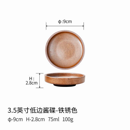 A rough pottery dipping sauce dish