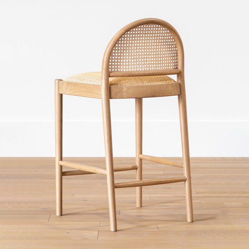 A solid wood rattan chair