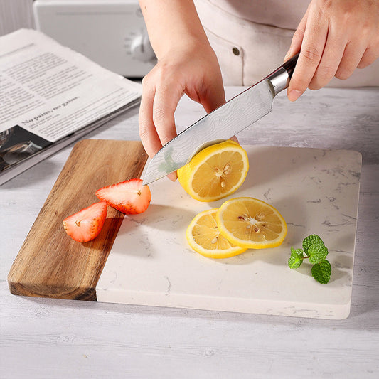 A solid wood cutting board marble splicing acacia wood