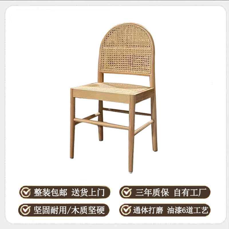 A solid wood rattan chair