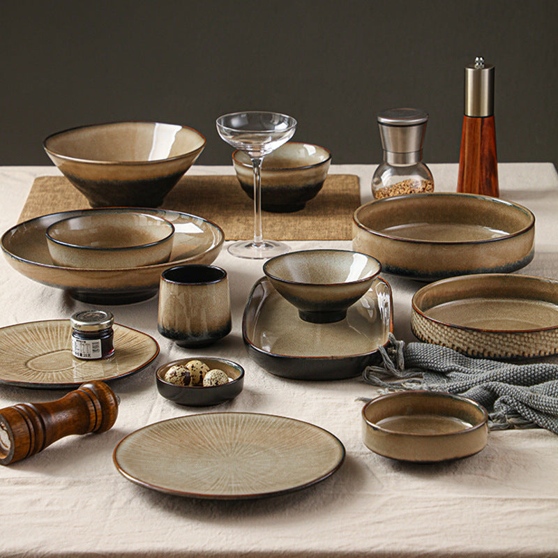 A Japanese-style kiln-changed retro coffee gold creative ceramics simple high-end light luxury cup, bowl, plate and tableware combination set
