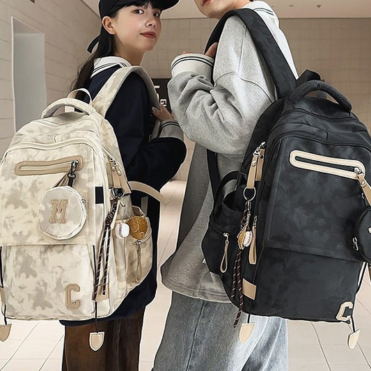 A Korean version ins new high-value solid color alphabet backpack couple casual simple lightweight large-capacity backpack