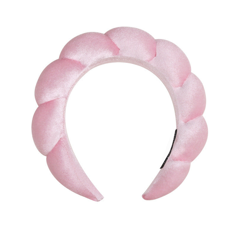 A towel fleece sponge twist headband