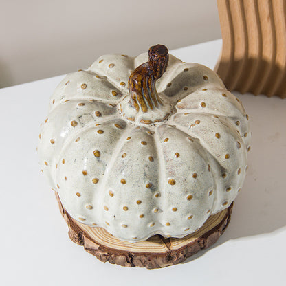 A ceramic pumpkin ornament