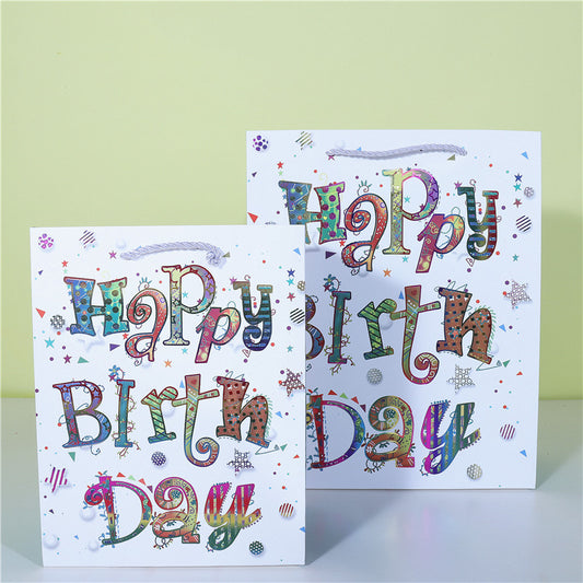 A happy birthday gift paper bag cake wrapping paper bag balloon candle shopping bag spot wholesale plush toy bag