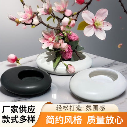 A ceramic flower pot potting container