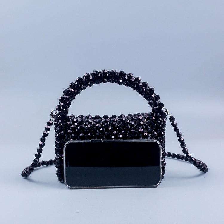 A simple black horn bead acrylic handbag bag handmade beaded woven portable messenger bag