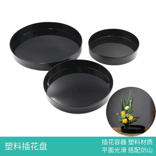 A Plastic flower plate flower arrangement device