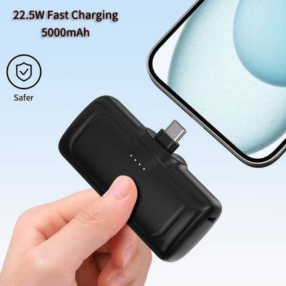 A capsule power bank 5000 mAh with its own cable portable mobile power supply