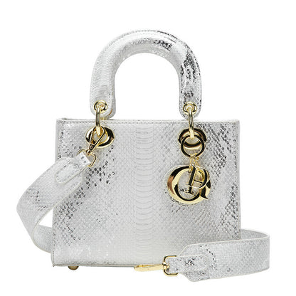 A snake pattern new Princess Diana bag, high-end shoulder messenger bag, high-end fashion pink handbag.