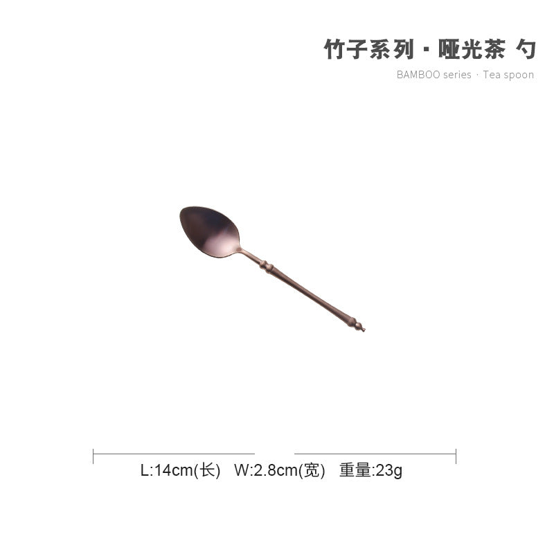 A stainless steel knife and fork set