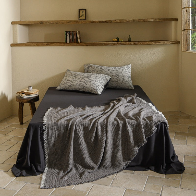 بطانية منسوجة من القطن والكتان مزينة بشرابات