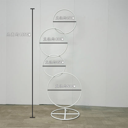 A wrought iron flower stand road guide