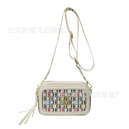 A Europe and the United States new personality letter style color fashion popular letter solid color shoulder messenger bag tide