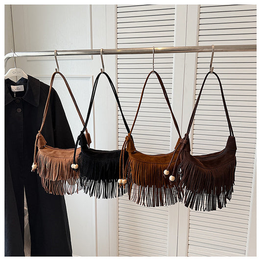 A fringed shoulder bag